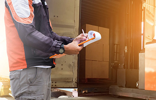 Cross Docking Employee Unloading Truck