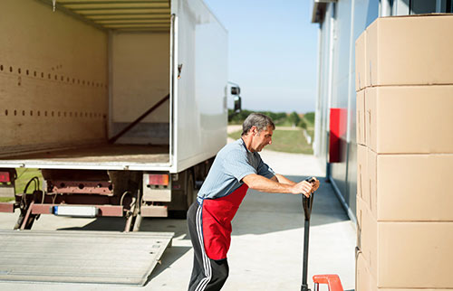  Babs Delivery Service employee unloading truck load